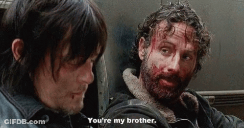 A Man With Blood On His Face Is Talking To Another Man Who Says You 'Re My Brother GIF