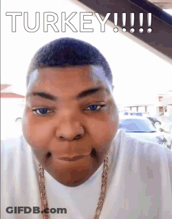 A Man With Blue Eyes And A Nose Ring Is Making A Funny Face . GIF