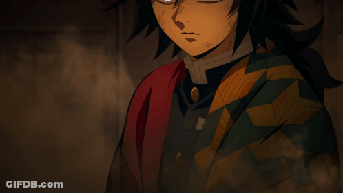 A Man With Blue Eyes Is Holding A Sword GIF