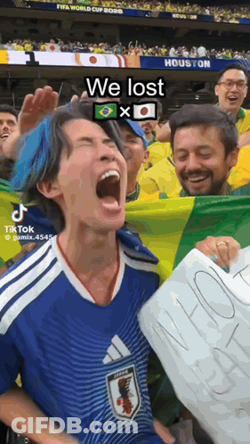 A Man With Blue Hair Is Holding A Sign That Says ' We Lost ' GIF