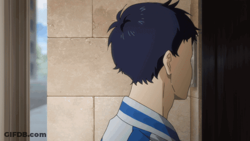 A Man With Blue Hair Looks Out A Doorway GIF