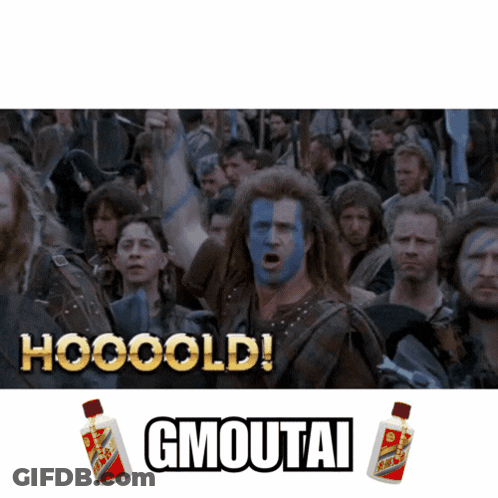 A Man With Blue Paint On His Face Stands In Front Of A Crowd And Says Hooooold Gmoutai GIF