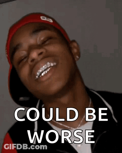 A Man With Braces On His Teeth Is Smiling With The Words " Could Be Worse " Below Him GIF