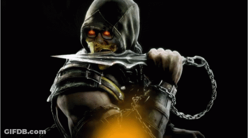 A Man With Chains Around His Arms Is Holding A Knife GIF