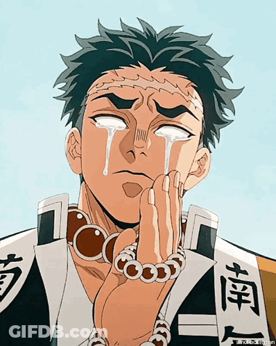A Man With Chinese Writing On His Shirt Is Crying With Tears Running Down His Face GIF