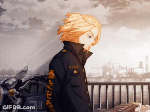 A Man With Chinese Writing On His Sleeves GIF