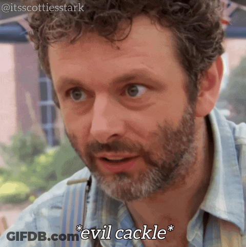 A Man With Curly Hair And A Beard Is Saying " Evil Cackle " GIF