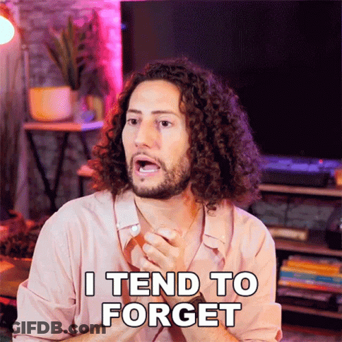 A Man With Curly Hair And A Beard Is Saying I Tend To Forget GIF