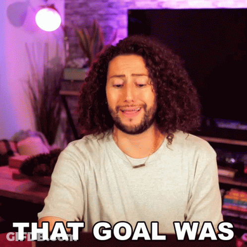 A Man With Curly Hair And A Beard Says " That Goal Was " GIF