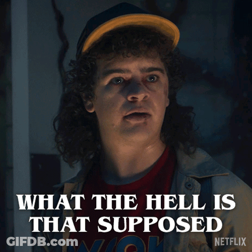 A Man With Curly Hair And A Hat Says What The Hell Is That Supposed GIF