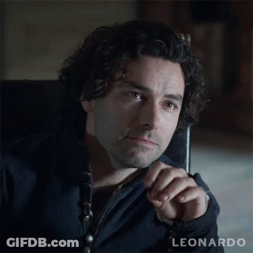 A Man With Curly Hair And The Name Leonardo On The Bottom Right GIF