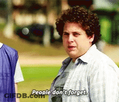 A Man With Curly Hair Is Saying People Don 'T Forget GIF