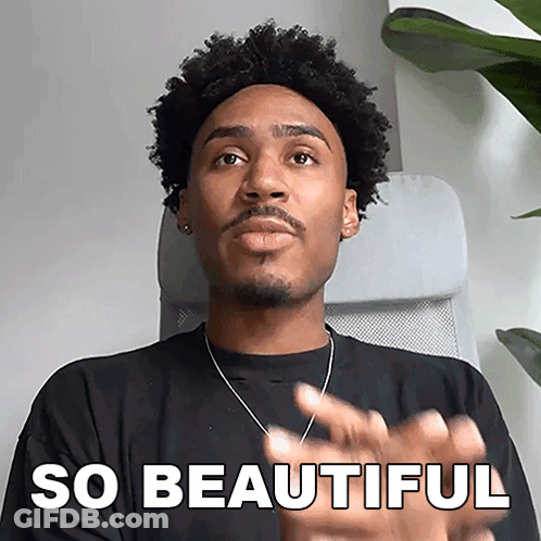 Man With Curly Hair Sitting With So Beautiful Text GIF
