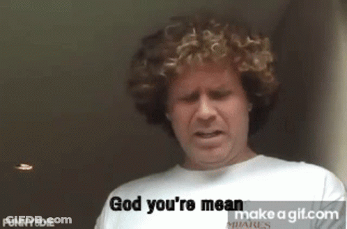 A Man With Curly Hair Is Wearing A White Shirt That Says God You 'Re Mean . GIF
