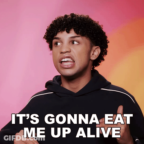 A Man With Curly Hair Says " It 'S Gonna Eat Me Up Alive " In Front Of A Pink Background GIF