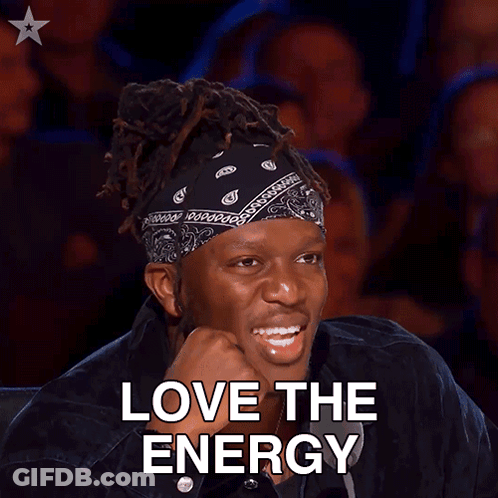 A Man With Dreadlocks And A Bandana On His Head Is Smiling With The Words Love The Energy Below Him GIF