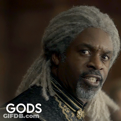 A Man With Dreadlocks And A Beard Has The Word Gods Written Below Him GIF