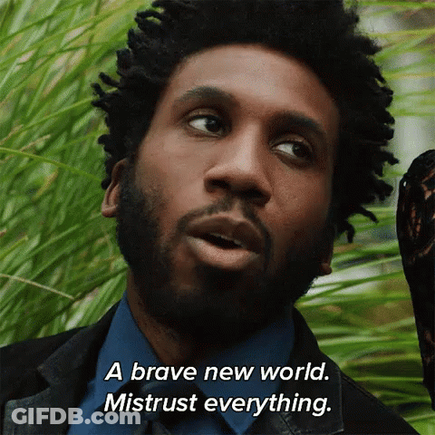 Man With Dreadlocks And Beard Saying Brave New World Mistrust Everything GIF