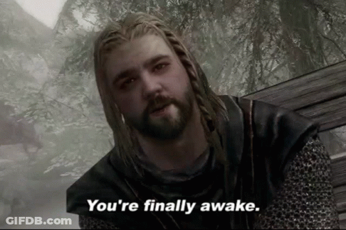 A Man With Dreadlocks And A Beard Says " You 'Re Finally Awake " GIF