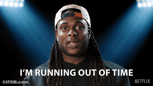 A Man With Dreadlocks And A Hat Says " I 'M Running Out Of Time " GIF