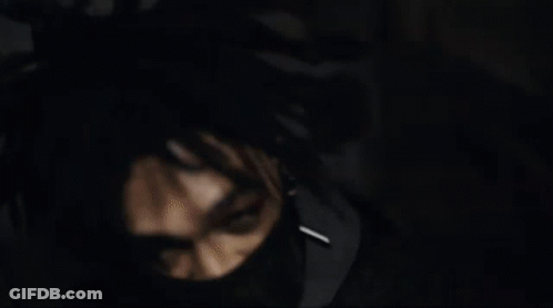 A Man With Dreadlocks And Black Nails Is Making A Middle Finger Gesture GIF