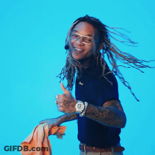 A Man With Dreadlocks Giving A Thumbs Up Sign GIF