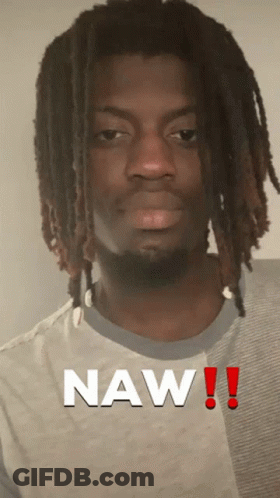 A Man With Dreadlocks Has The Word Naw Written On His Shirt GIF