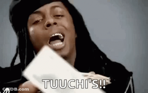 A Man With Dreadlocks Is Holding A Bunch Of Money In His Hands And Shouting . GIF