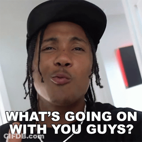 Dreadlocked Man Making Funny Face Asking What's Going On GIF