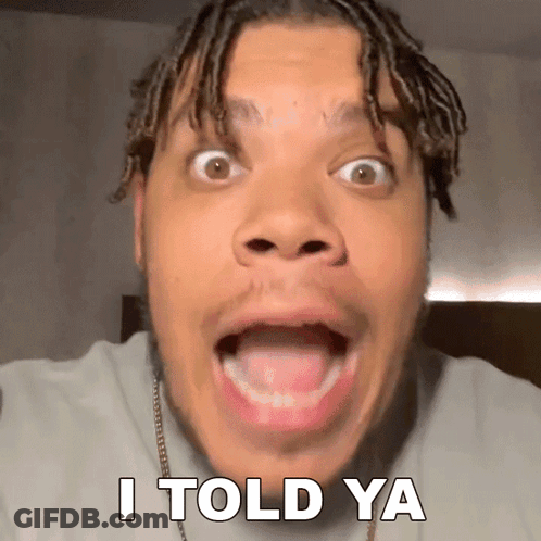 A Man With Dreadlocks Is Making A Funny Face With The Words I Told Ya Behind Him GIF