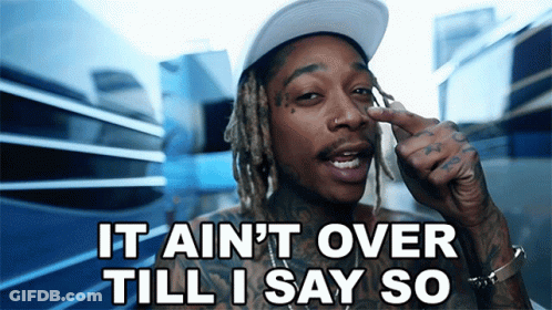A Man With Dreadlocks Is Pointing At His Nose And Says It Ain T Over Till I Say So GIF
