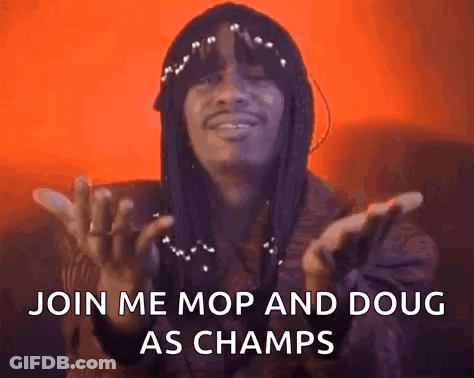 A Man With Dreadlocks Is Saying `` Join Me Mop And Doug As Champs '' With His Hands In The Air . GIF