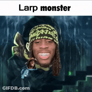 A Man With Dreadlocks Is Wearing A Beanie And Smiling With The Words Larp Monster Above Him . GIF
