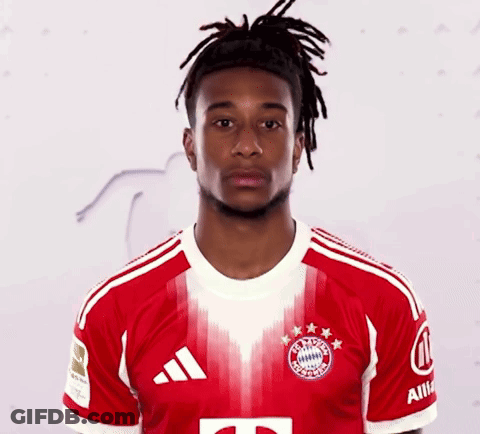 A Man With Dreadlocks Is Wearing A Red And White Adidas Shirt GIF