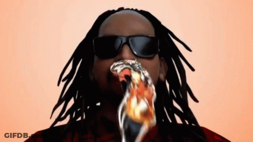 A Man With Dreadlocks Is Wearing Sunglasses And Eating A Piece Of Pizza GIF