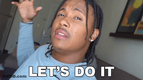 A Man With Dreadlocks Says Let 'S Do It With His Hands In The Air GIF