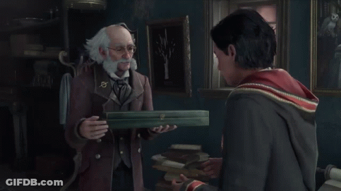 A Man With Glasses And A Badge With A Circle On It Is Reading A Book GIF