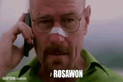 A Man With Glasses And A Bandage On His Nose Is Talking On A Cell Phone And Saying Rosawon . GIF