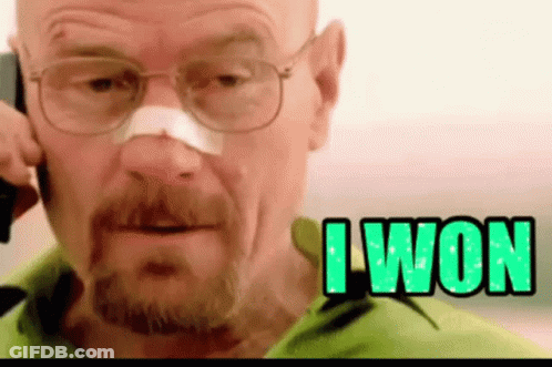 A Man With Glasses And A Bandage On His Nose Is Talking On A Cell Phone And Says I Won . GIF