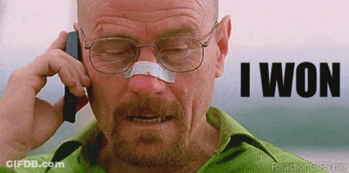 A Man With Glasses And A Bandage On His Nose Is Talking On A Cell Phone And Says I Won GIF