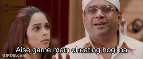 A Man With Glasses And A Bandana On His Head Says " Aise Game Mein Cheating Hogi Na " Next To A Woman GIF