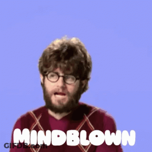 A Man With Glasses And A Beard Has A Box Coming Out Of His Head That Says Mindblown GIF