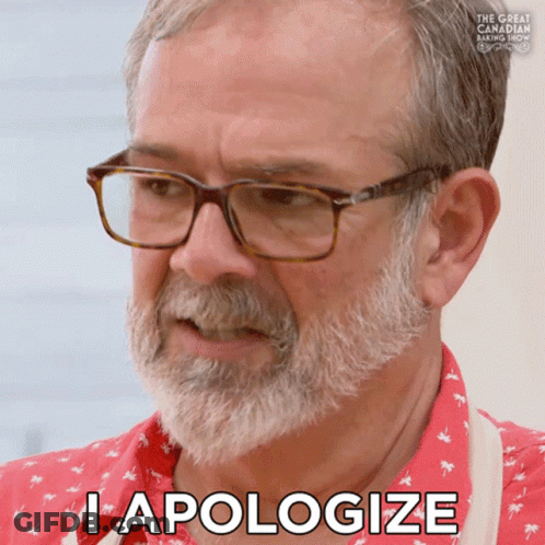 A Man With Glasses And A Beard Has The Word Apologize On His Face GIF