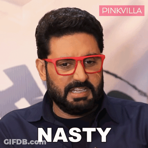 A Man With Glasses And A Beard Has The Word Nasty Written On His Face GIF