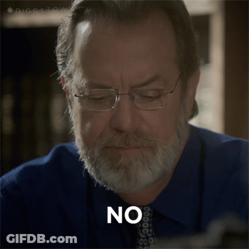 A Man With Glasses And A Beard Has The Word No On His Face GIF