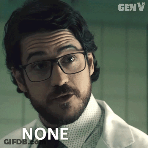 A Man With Glasses And A Beard Has The Word None On His Face GIF