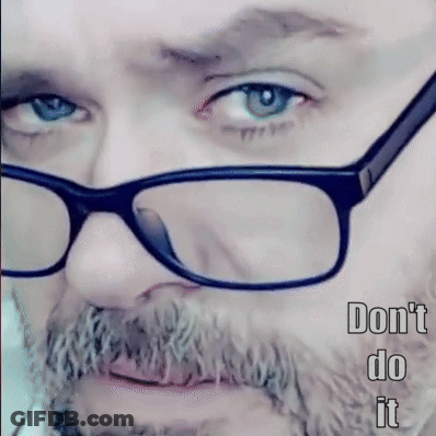 A Man With Glasses And A Beard Has The Words " Do N't Do It " Below Him GIF
