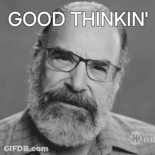 A Man With Glasses And A Beard Has The Words Good Thinkin ' On His Face GIF