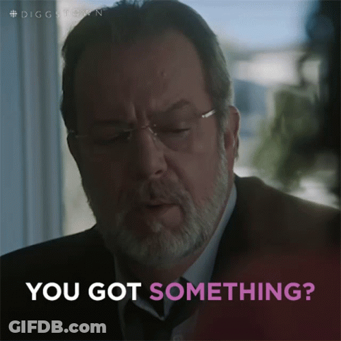 A Man With Glasses And A Beard Is Asking If He Has Something GIF