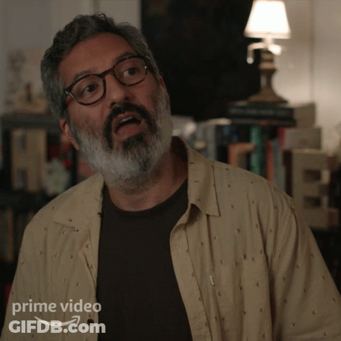 A Man With Glasses And A Beard Is Featured On A Prime Video Ad GIF